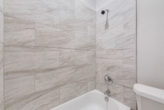 full bathroom featuring toilet and shower / tub combination