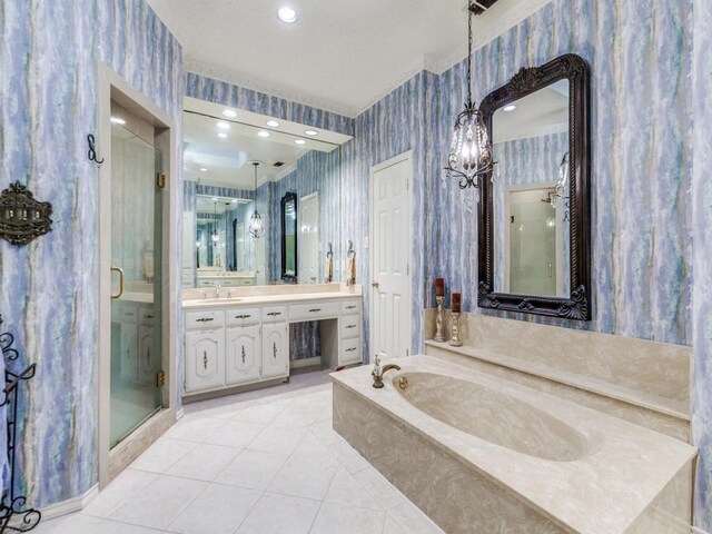 5405 Channel Isle Dr, Plano, TX 75093 - bathroom featuring wallpapered walls, a shower stall, tile patterned flooring, a garden tub, and a chandelier