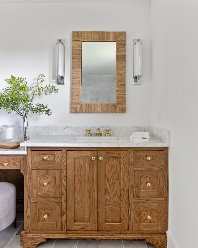 bathroom with tile patterned floors and vanity