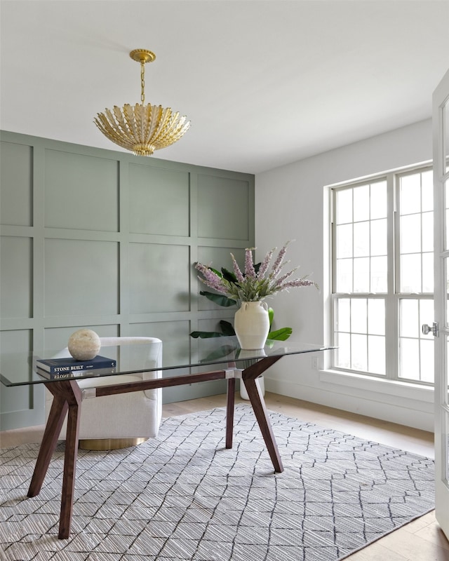 dining space with a decorative wall