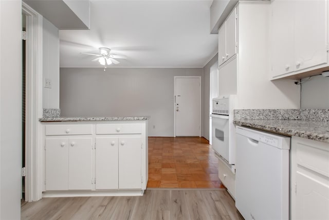 6007 Sandhurst Ln Unit B, Dallas, TX 75206 - kitchen featuring white appliances, a ceiling fan, white cabinets, and light stone countertops