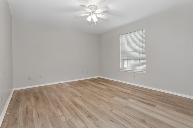 6007 Sandhurst Ln Unit B, Dallas, TX 75206 - empty room featuring baseboards, ceiling fan, and light wood-type flooring
