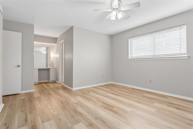 6007 Sandhurst Ln Unit B, Dallas, TX 75206 - unfurnished room featuring light wood-style floors, baseboards, and ceiling fan