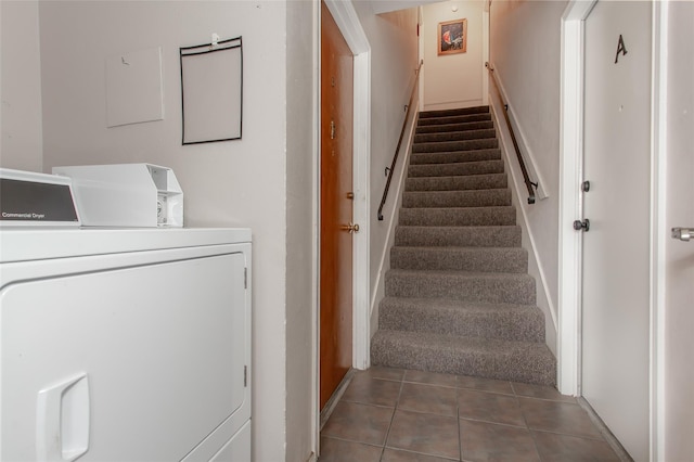 6007 Sandhurst Ln Unit B, Dallas, TX 75206 - stairway with washer and clothes dryer and tile patterned floors