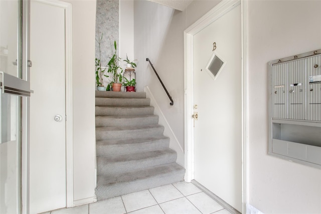 6007 Sandhurst Ln Unit B, Dallas, TX 75206 - stairway with tile patterned floors and baseboards