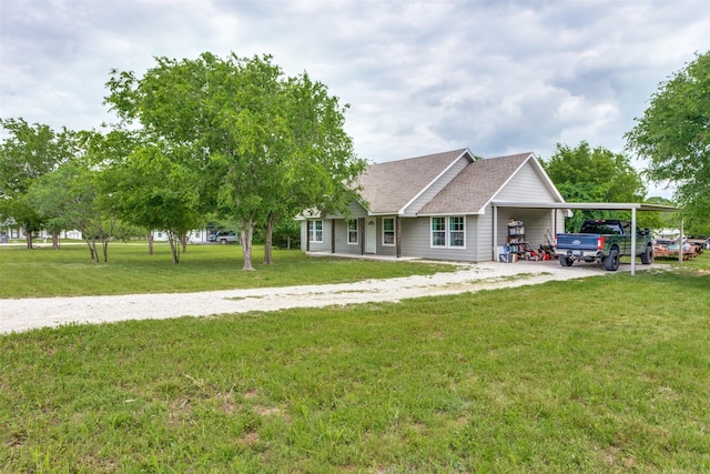 140 Tnt Ct, Springtown, TX 76082 - view of front of home with a front lawn, roof with shingles, driveway, and a carport