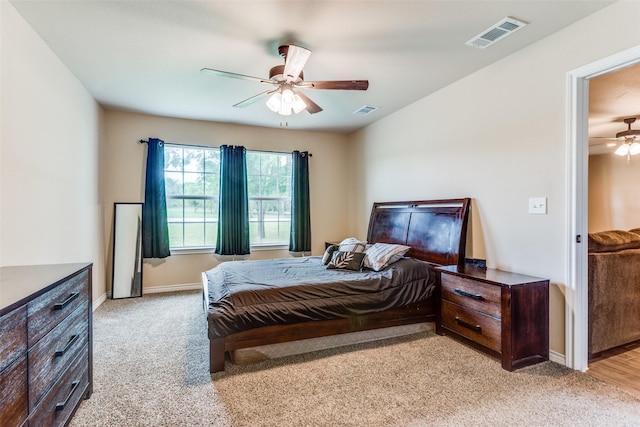140 Tnt Ct, Springtown, TX 76082 - bedroom with baseboards, light carpet, and visible vents
