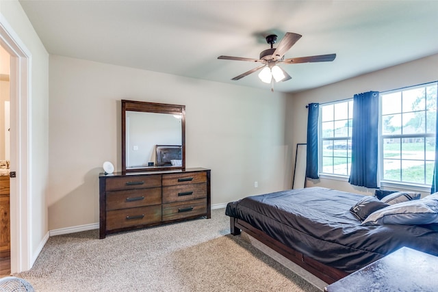 140 Tnt Ct, Springtown, TX 76082 - bedroom with baseboards, ceiling fan, and light colored carpet