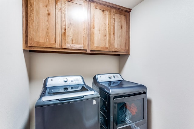 140 Tnt Ct, Springtown, TX 76082 - laundry area featuring cabinet space and independent washer and dryer
