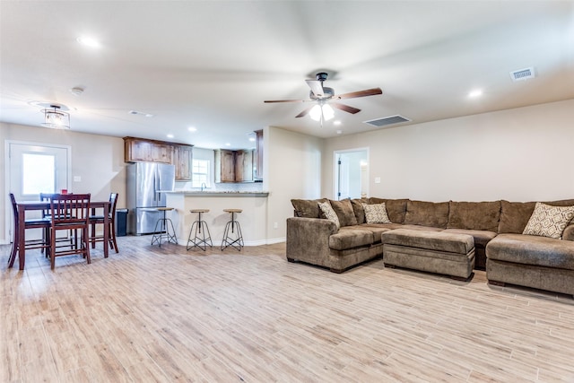 140 Tnt Ct, Springtown, TX 76082 - living room featuring light wood-style floors, a ceiling fan, recessed lighting, and visible vents