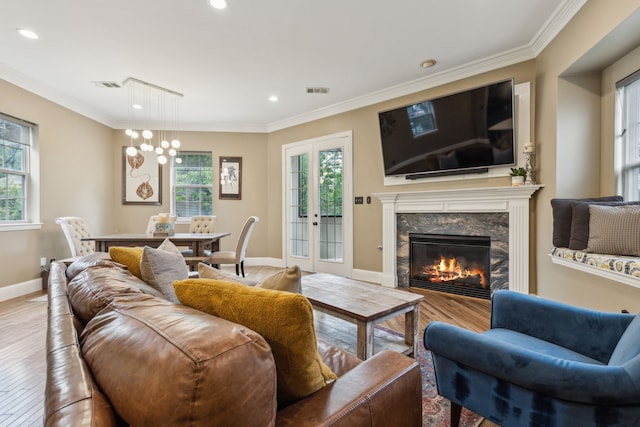 5102 Ridgedale Ave, Dallas, TX 75206 - living room with wood finished floors, ornamental molding, a premium fireplace, recessed lighting, and baseboards