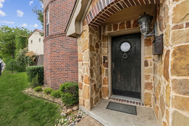 5102 Ridgedale Ave, Dallas, TX 75206 - doorway to property featuring brick siding and stone siding
