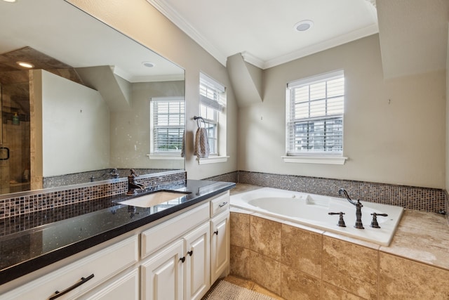 5102 Ridgedale Ave, Dallas, TX 75206 - bathroom with healthy amount of natural light, a bath, vanity, ornamental molding, and a stall shower