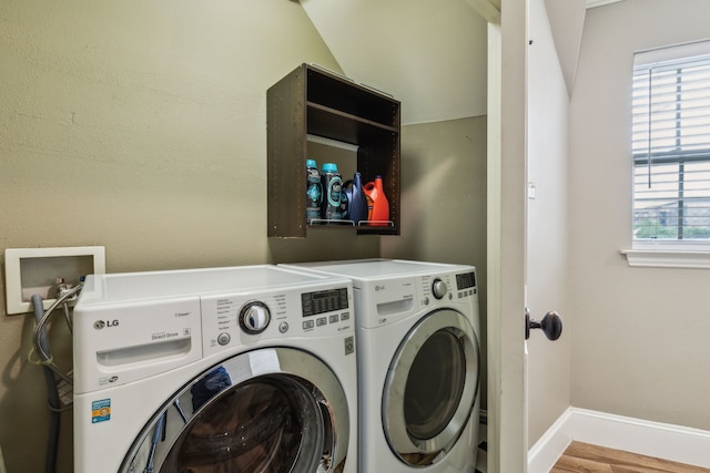 5102 Ridgedale Ave, Dallas, TX 75206 - laundry area featuring separate washer and dryer, baseboards, and wood finished floors