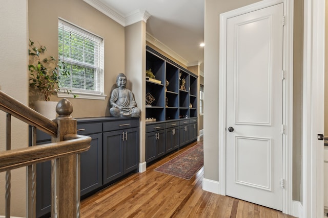 5102 Ridgedale Ave, Dallas, TX 75206 - bar with ornamental molding and light wood finished floors