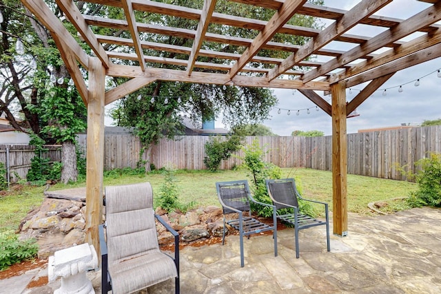 view of patio / terrace featuring a fenced backyard and a pergola