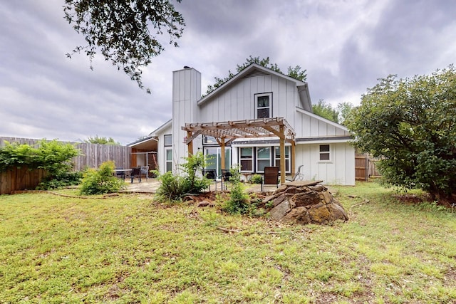 back of property featuring board and batten siding, a chimney, a patio, a fenced backyard, and a pergola