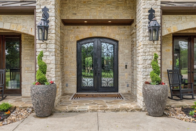 2291 W Fm 550, Rockwall, TX 75032 - doorway to property with french doors and stone siding