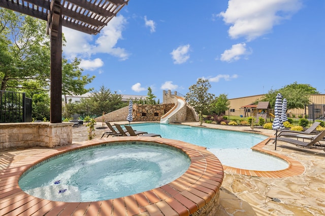 2291 W Fm 550, Rockwall, TX 75032 - view of pool featuring an in ground hot tub, a patio area, fence, a fenced in pool, and a water slide