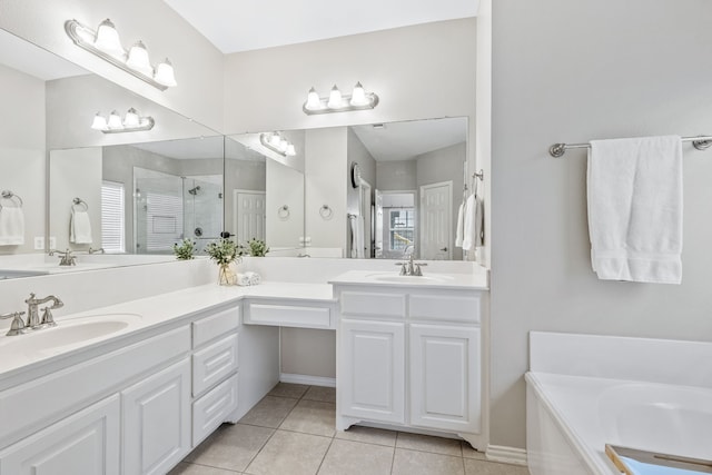 full bathroom featuring double vanity, a sink, tile patterned floors, and a shower stall