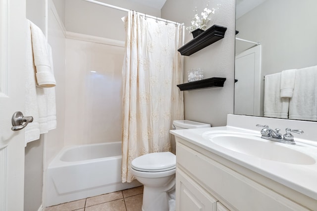 full bathroom with toilet, shower / bath combo, tile patterned flooring, and vanity