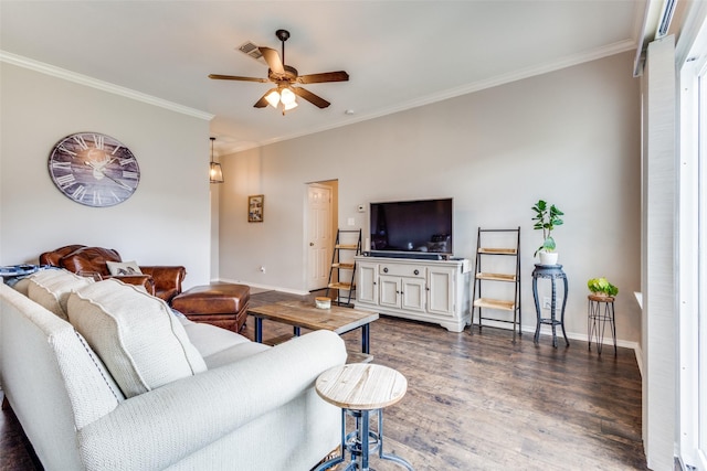 living area with crown molding, a ceiling fan, baseboards, and dark wood-style flooring