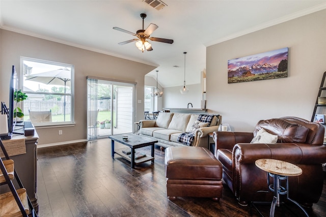 living area with crown molding, ceiling fan, baseboards, dark wood-type flooring, and visible vents