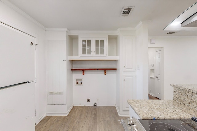 laundry room with visible vents, ornamental molding, washer hookup, light wood finished floors, and hookup for an electric dryer