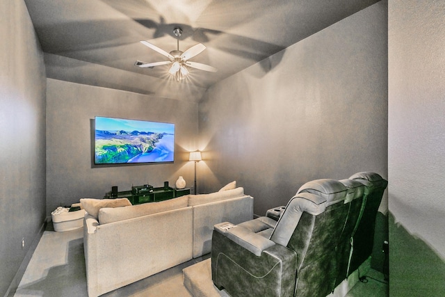 cinema room with ceiling fan