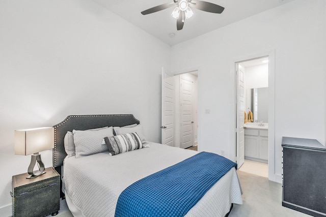 bedroom featuring ensuite bathroom and a ceiling fan