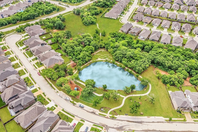 aerial view featuring a water view and a residential view