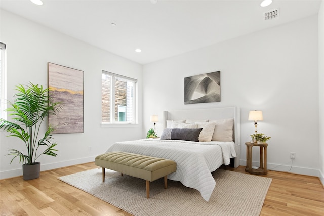 1944 Kearney Ct, Dallas, TX 75204 - bedroom featuring recessed lighting, baseboards, visible vents, and light wood-style floors