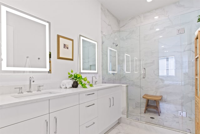 1944 Kearney Ct, Dallas, TX 75204 - full bath featuring a sink, a marble finish shower, double vanity, and marble finish floor