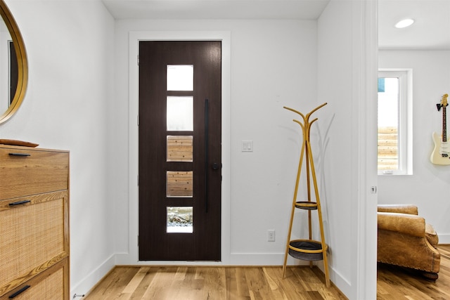 1944 Kearney Ct, Dallas, TX 75204 - entrance foyer featuring baseboards and light wood finished floors