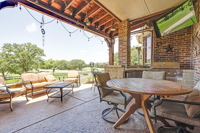 view of patio with an outdoor hangout area, outdoor dining area, grilling area, and area for grilling
