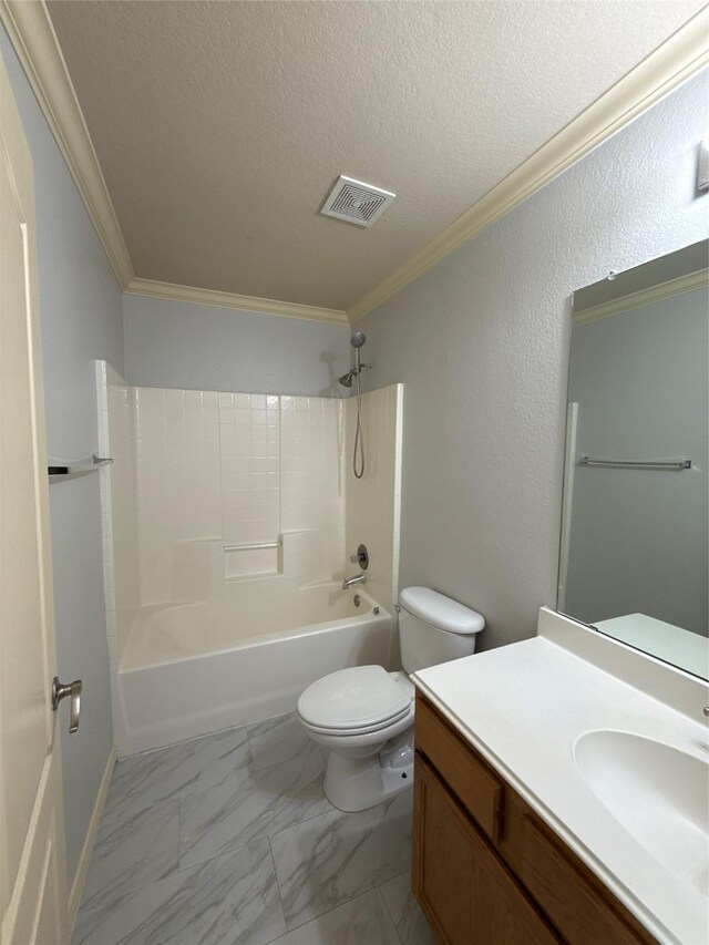 full bath featuring crown molding, vanity, toilet, a textured ceiling, and marble finish floor