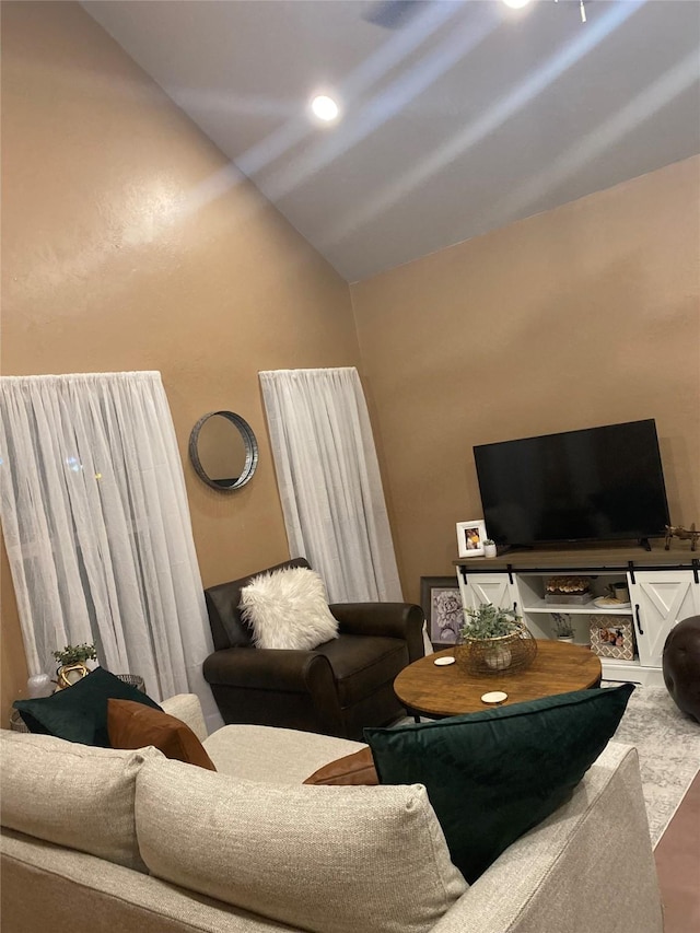 living area with lofted ceiling