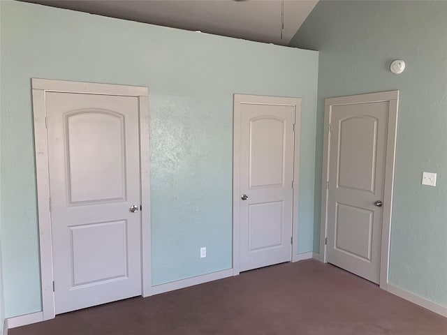 unfurnished bedroom featuring baseboards