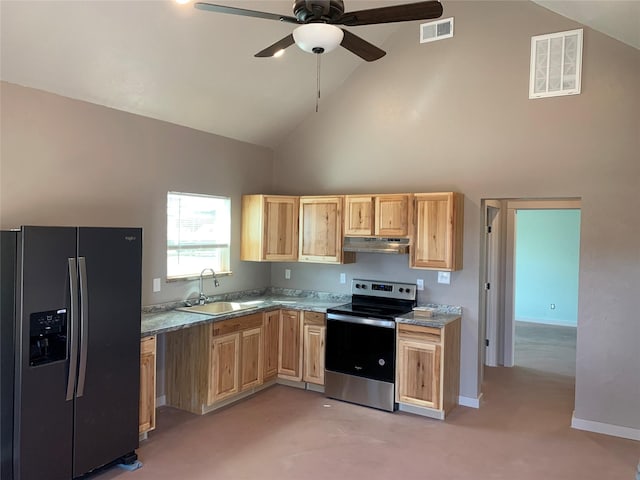 kitchen with visible vents, light brown cabinetry, under cabinet range hood, a sink, and stainless steel appliances