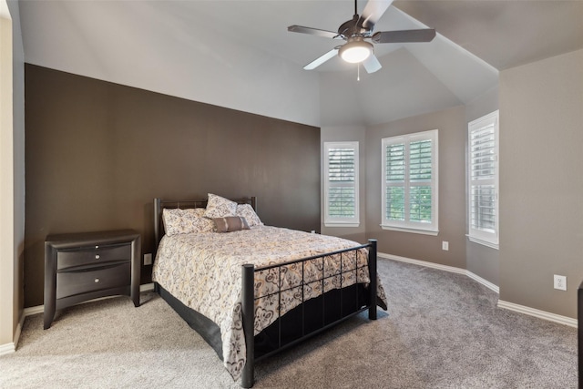 bedroom with carpet floors, baseboards, vaulted ceiling, and ceiling fan