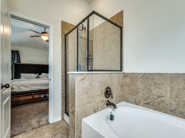 ensuite bathroom with ceiling fan, a stall shower, a bath, and connected bathroom
