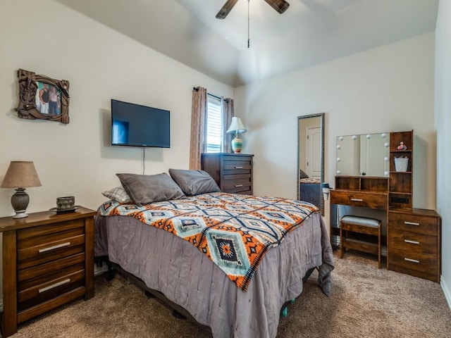 carpeted bedroom featuring a ceiling fan and lofted ceiling
