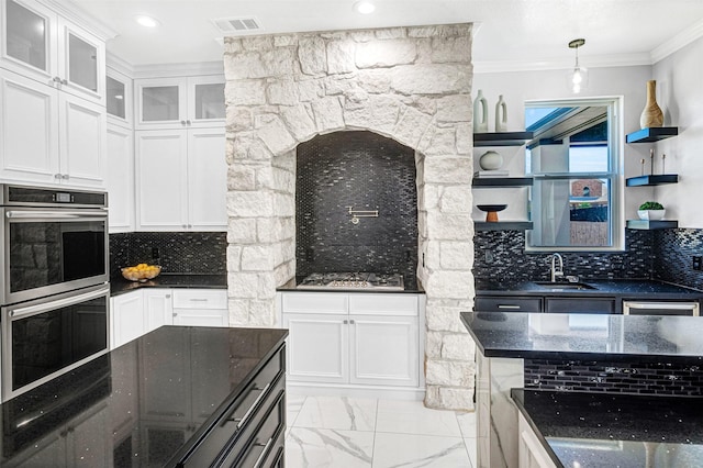 3401 Anthony Cir, Rowlett, TX 75088 - kitchen with stainless steel appliances, ornamental molding, open shelves, dark stone counters, and tasteful backsplash