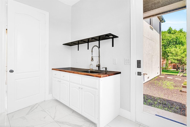 3401 Anthony Cir, Rowlett, TX 75088 - indoor wet bar with light marble finish floors