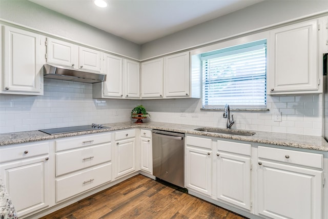 19 Salida Dr, Trophy Club, TX 76262 - kitchen featuring stainless steel dishwasher, under cabinet range hood, a sink, black electric cooktop, and white cabinets