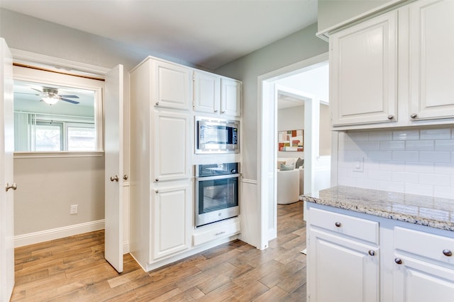 19 Salida Dr, Trophy Club, TX 76262 - kitchen featuring stainless steel appliances, light wood-style flooring, tasteful backsplash, and white cabinets