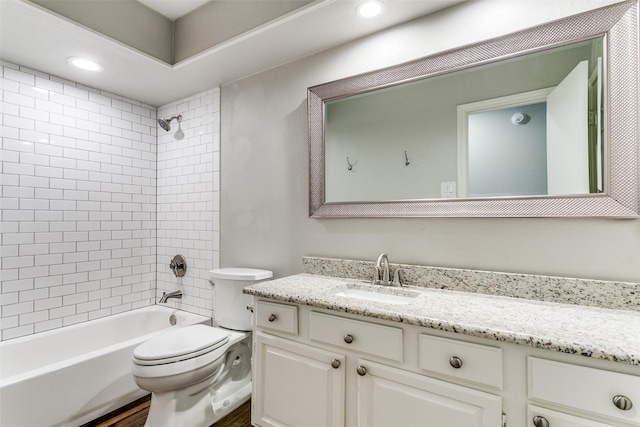 19 Salida Dr, Trophy Club, TX 76262 - full bath with toilet, vanity, washtub / shower combination, wood finished floors, and recessed lighting