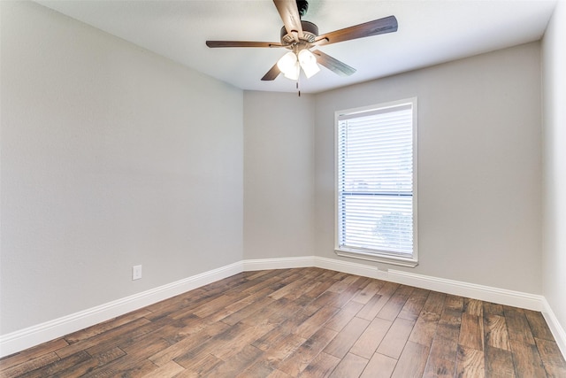 19 Salida Dr, Trophy Club, TX 76262 - spare room featuring baseboards, healthy amount of natural light, dark wood finished floors, and a ceiling fan