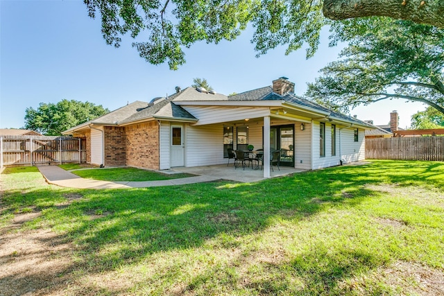 19 Salida Dr, Trophy Club, TX 76262 - rear view of property with a patio, a chimney, a shingled roof, and brick siding