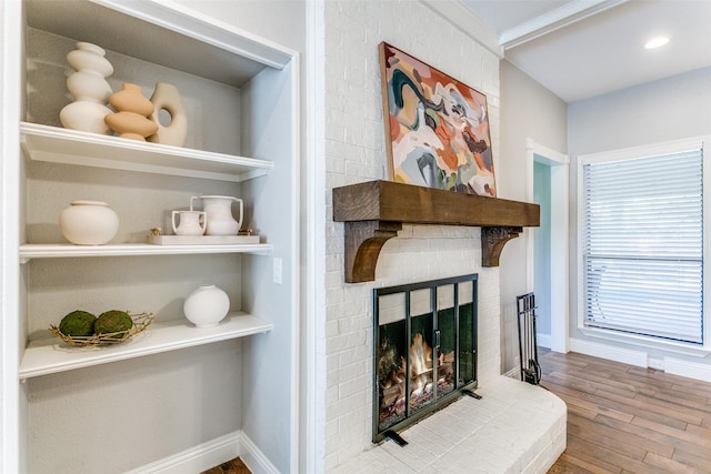 19 Salida Dr, Trophy Club, TX 76262 - detailed view of wood finished floors, baseboards, and a fireplace